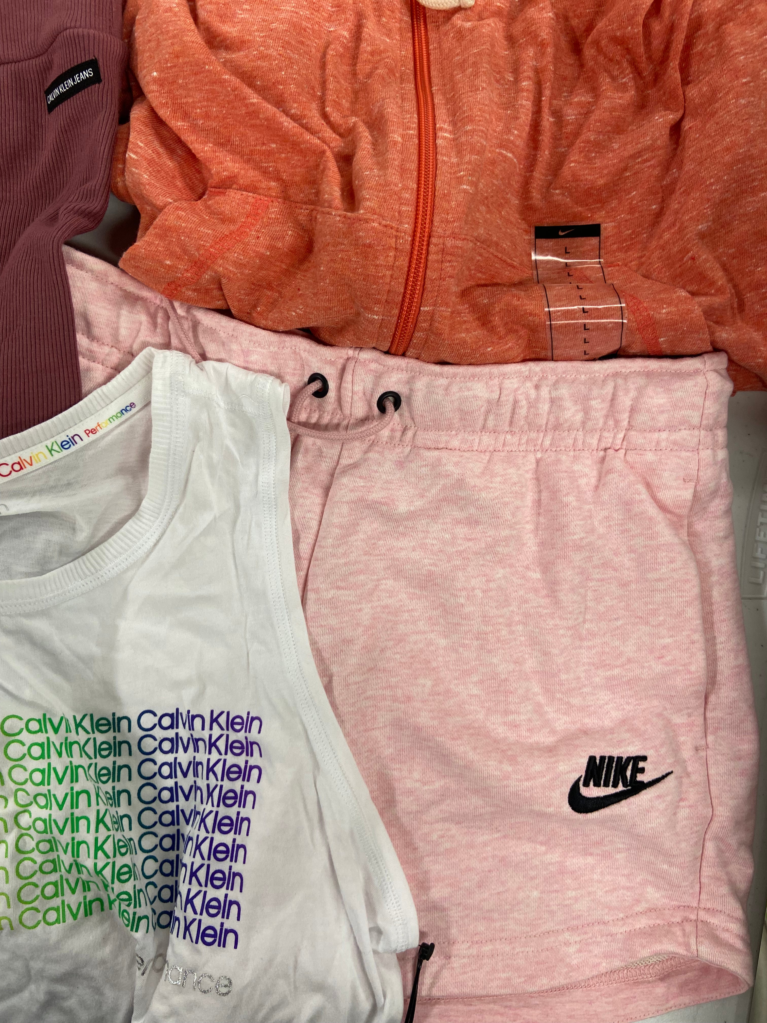 Women's Activewear Clothing Assorted Wholesale Lot, NIKE, CALVIN KLEIN, RONHILL and more, 19 items, Shelf Pulls, MSRP $726