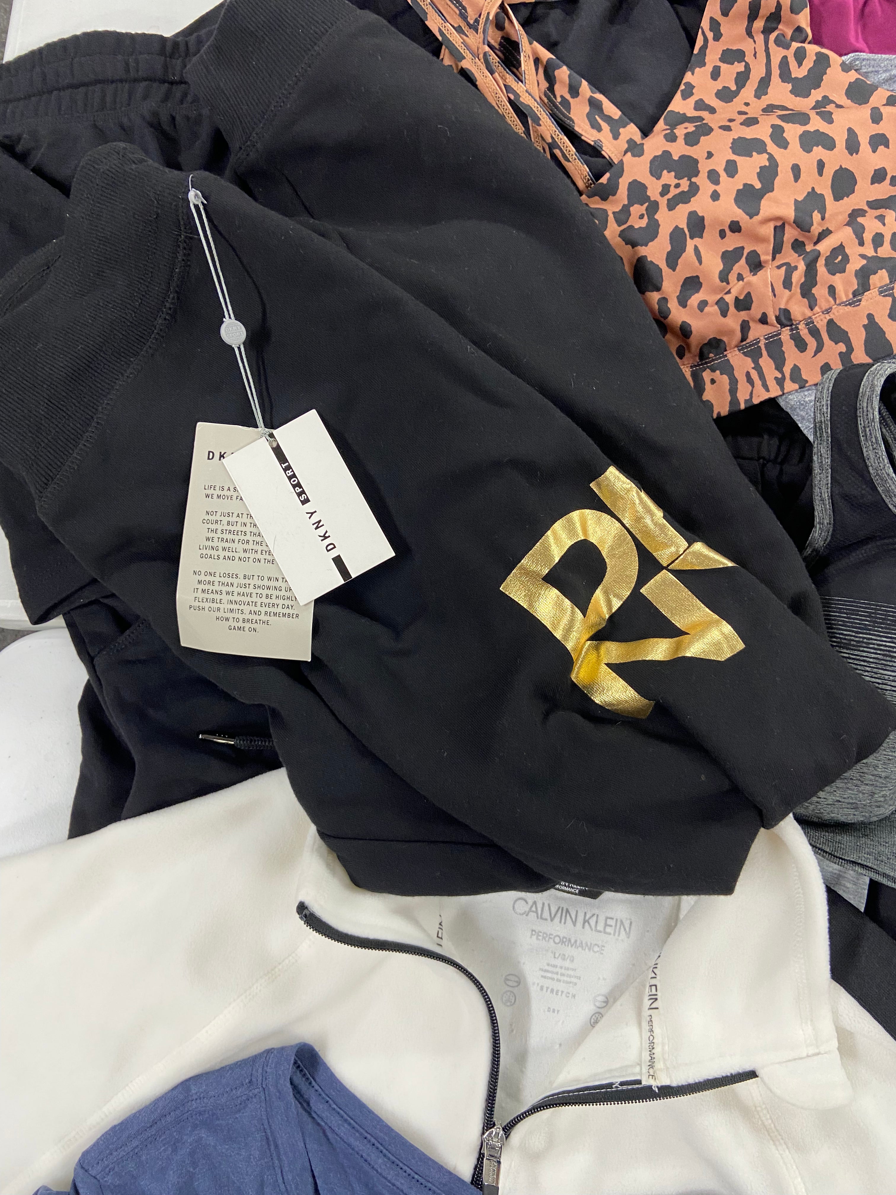 Women's Activewear Clothing Assorted Wholesale Lot, NIKE, CALVIN KLEIN, RONHILL and more, 19 items, Shelf Pulls, MSRP $726