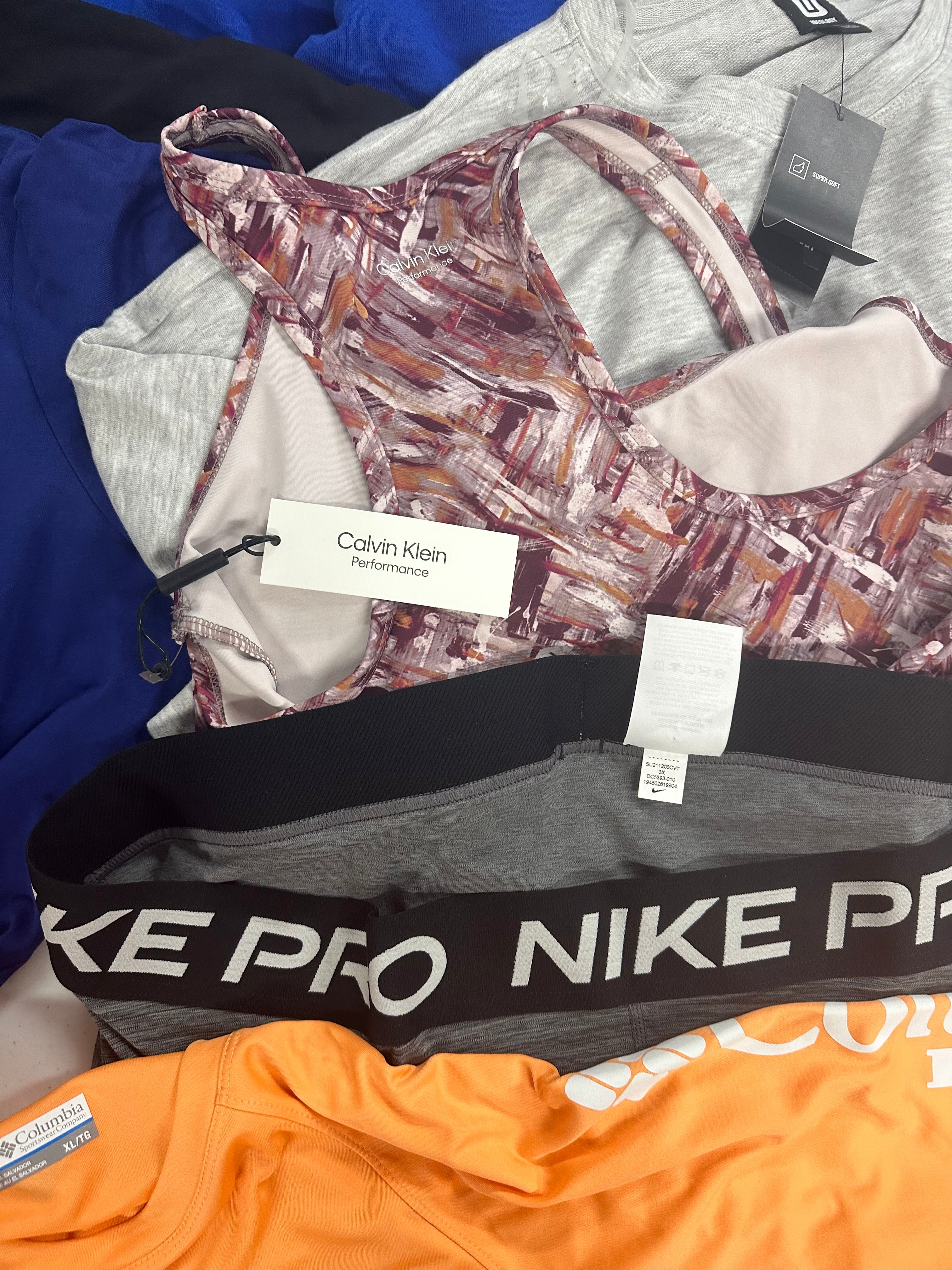 Women's Clothing Activewear Wholesale Lot, CALVIN KLEIN, COLUMBIA, NIKE, AMERICAN APPAREL and more, 11 items, Shelf Pulls, MSRP $432