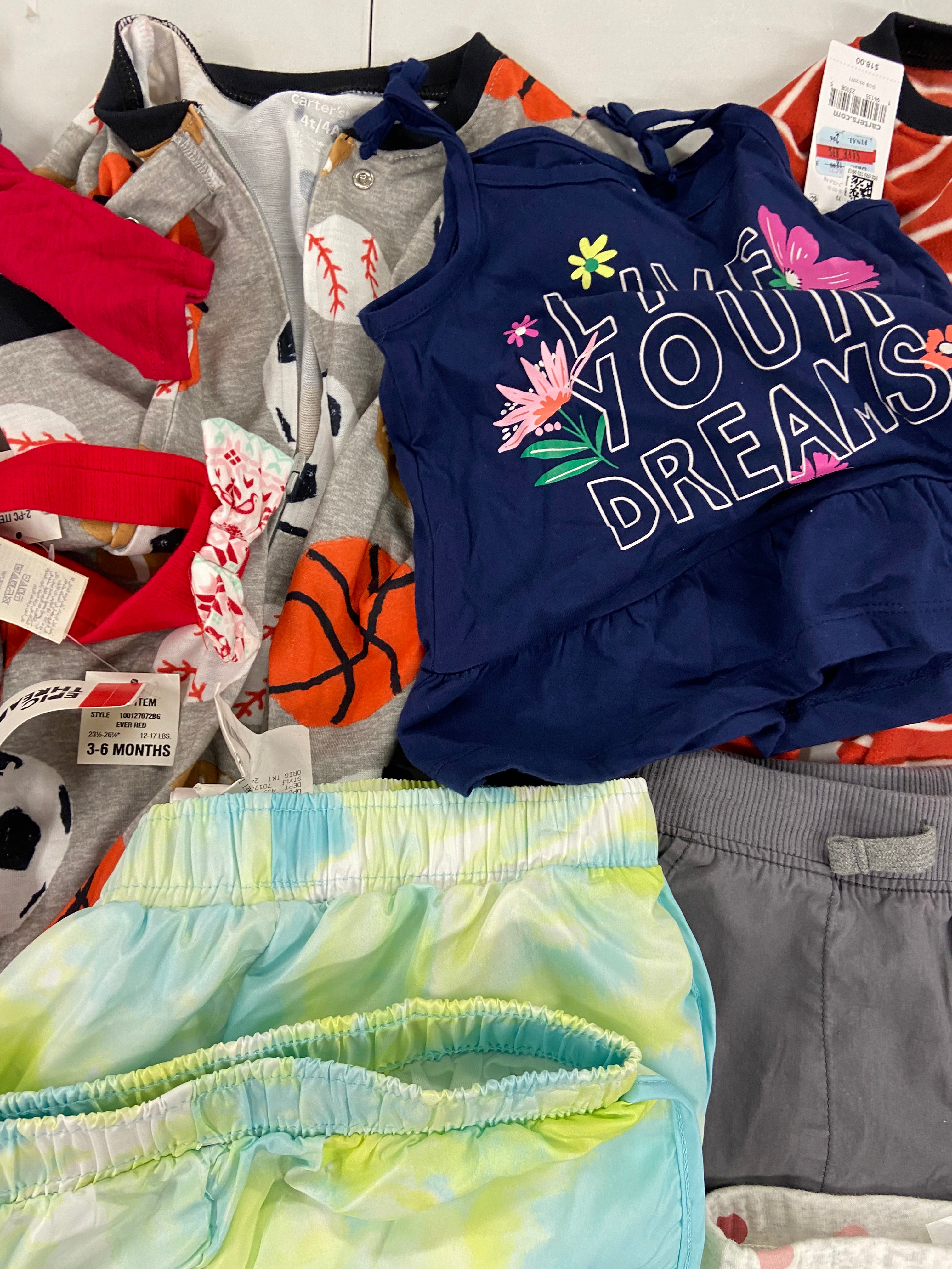 Kid's Clothing Assorted Wholesale Lot, DISNEY, GOGO JEANS, CARTER'S, CHAMPION, CUTIE PIE BABY, NEW BLUEBERRI, UNDER ARMOUR and more, 28 items, Shelf Pulls, MSRP $745