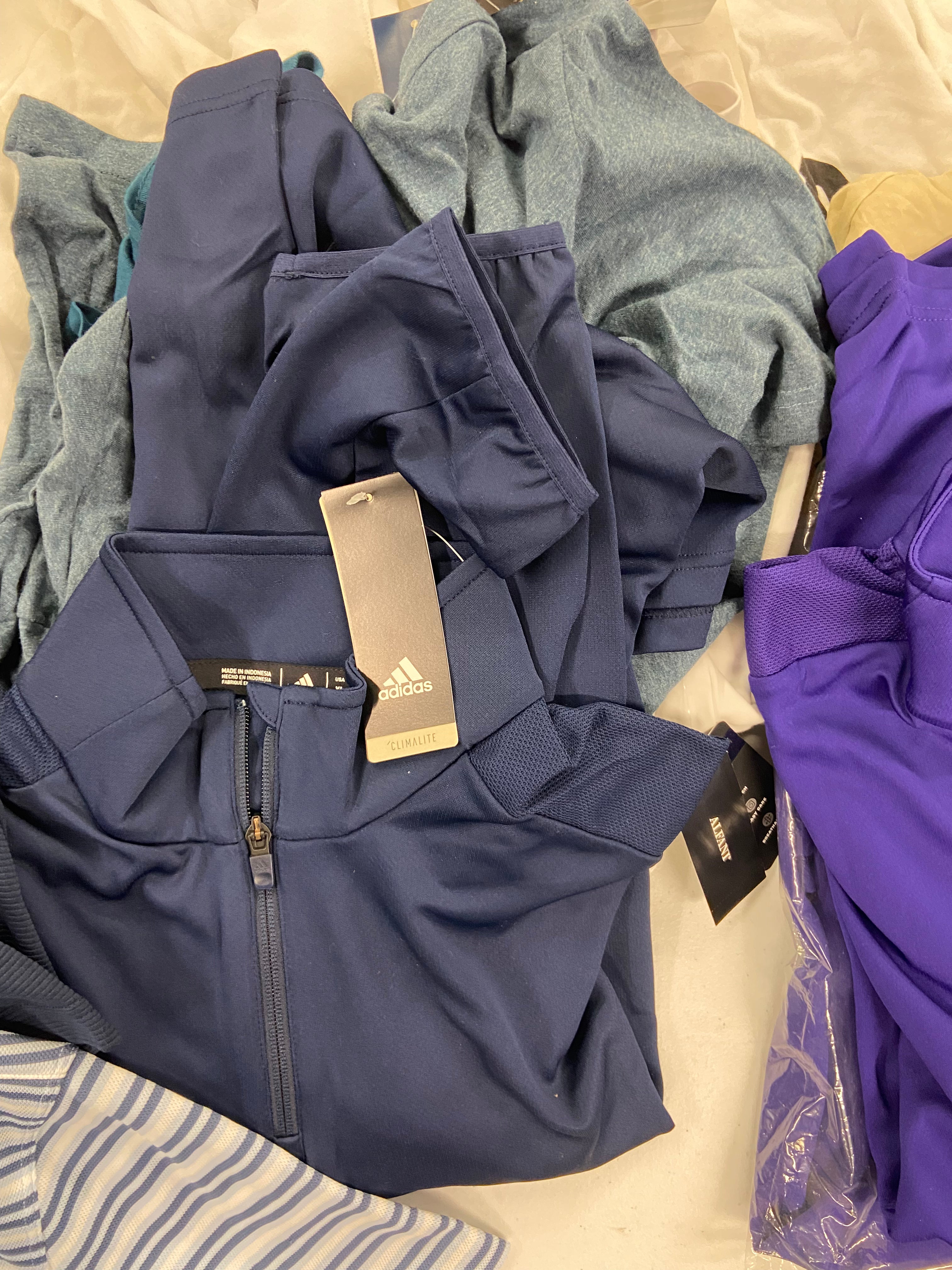 Men's Clothing T-Shirts & Other Tops, Wholesale Lot, ADIDAS, CALVIN KLEIN, NIKE, THE NORTH FACE, VOLCOM, PHILCOS, JUNKFOOD and more,  26 items, Shelf Pulls, MSRP $1,119