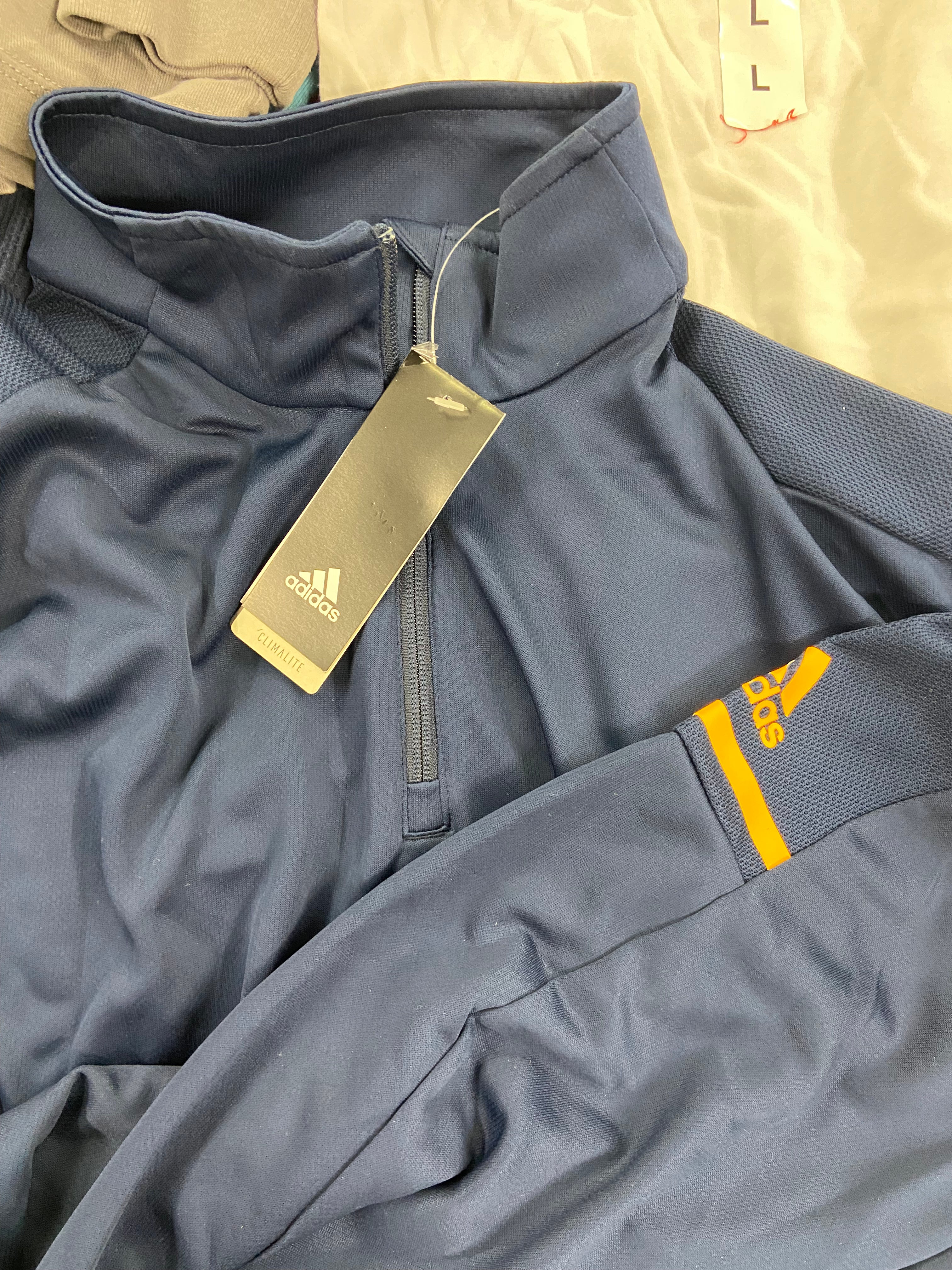 Men's Clothing T-Shirts & Others Wholesale Lot, ADIDAS, COLUMBIA, CALVIN KLEIN, UNDER ARMOUR, DOCKERS, UNIVIBE and more, 19 items, Shelf Pulls, MSRP $1,088