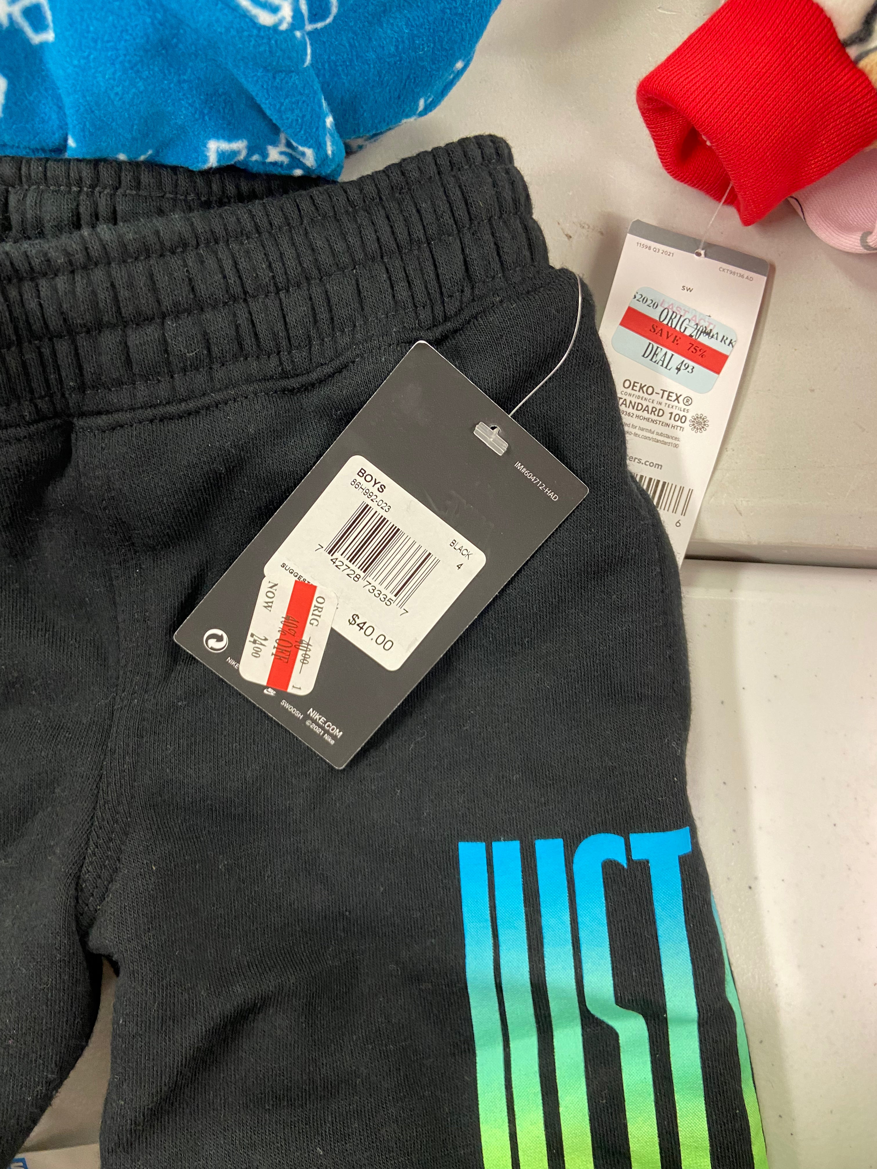 Baby's / Kid's Assorted Clothing Wholesale Lot, NIKE, TOMMY HILFIGER, PINKFONG, CALVIN KLEIN, NINA DOLL, CHAMPION, CARTER'S and more, 31 items, Shelf Pulls, MSRP $971