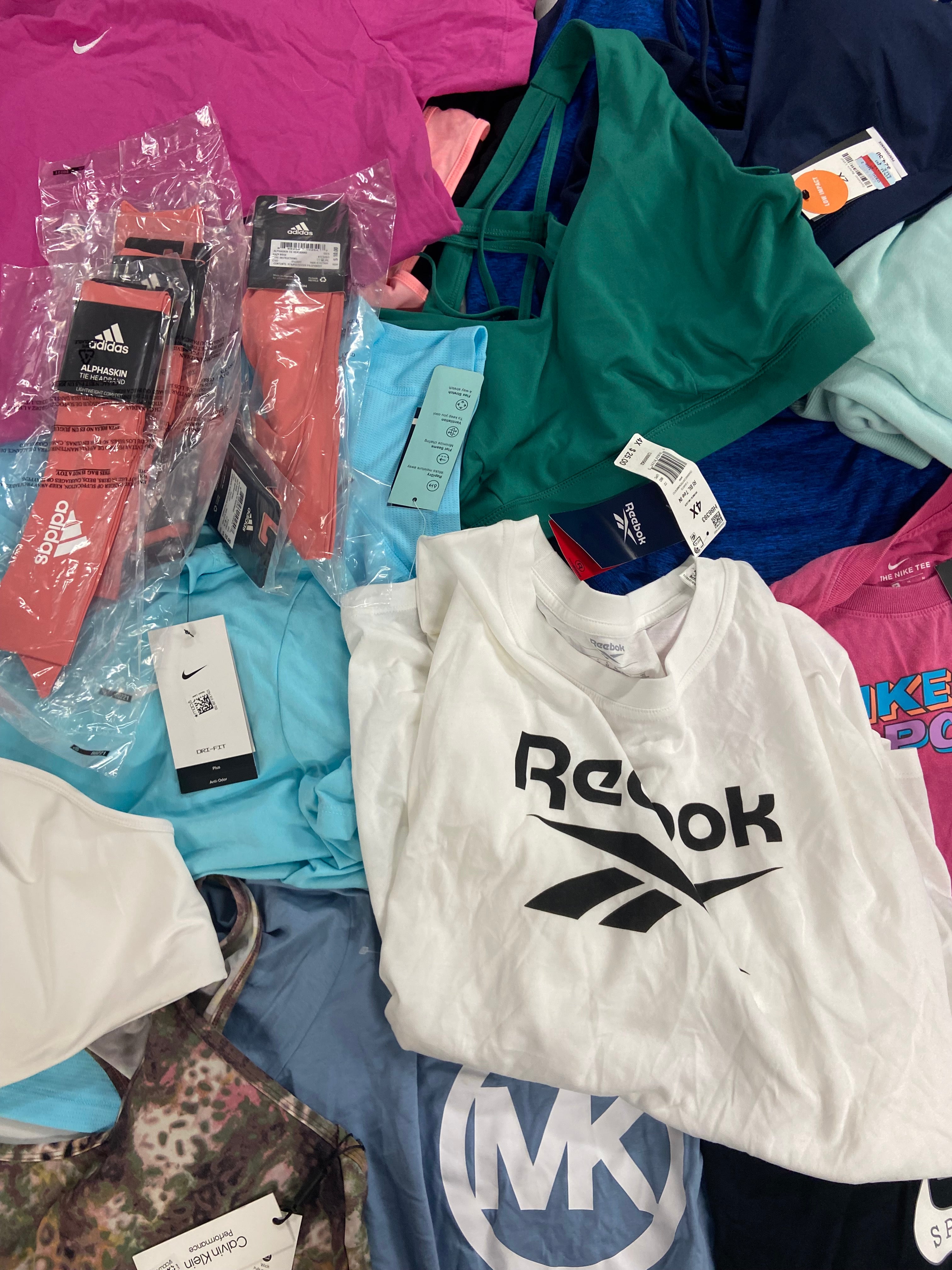 Women's Clothing Activewear Tops Wholesale Lot, NIKE, PUMA, MICHAEL KORS, REEBOK, ADIDAS and more, 21 items, Shelf Pulls, MSRP $598