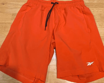 Reebok Mens Regular fit Drawstring Shorts Medium Orange Solid Moisture Wicking