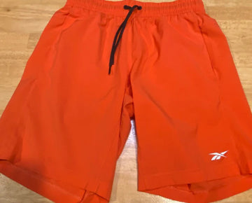 Reebok Mens Regular fit Drawstring Shorts Size L Orange Solid Moisture Wicking